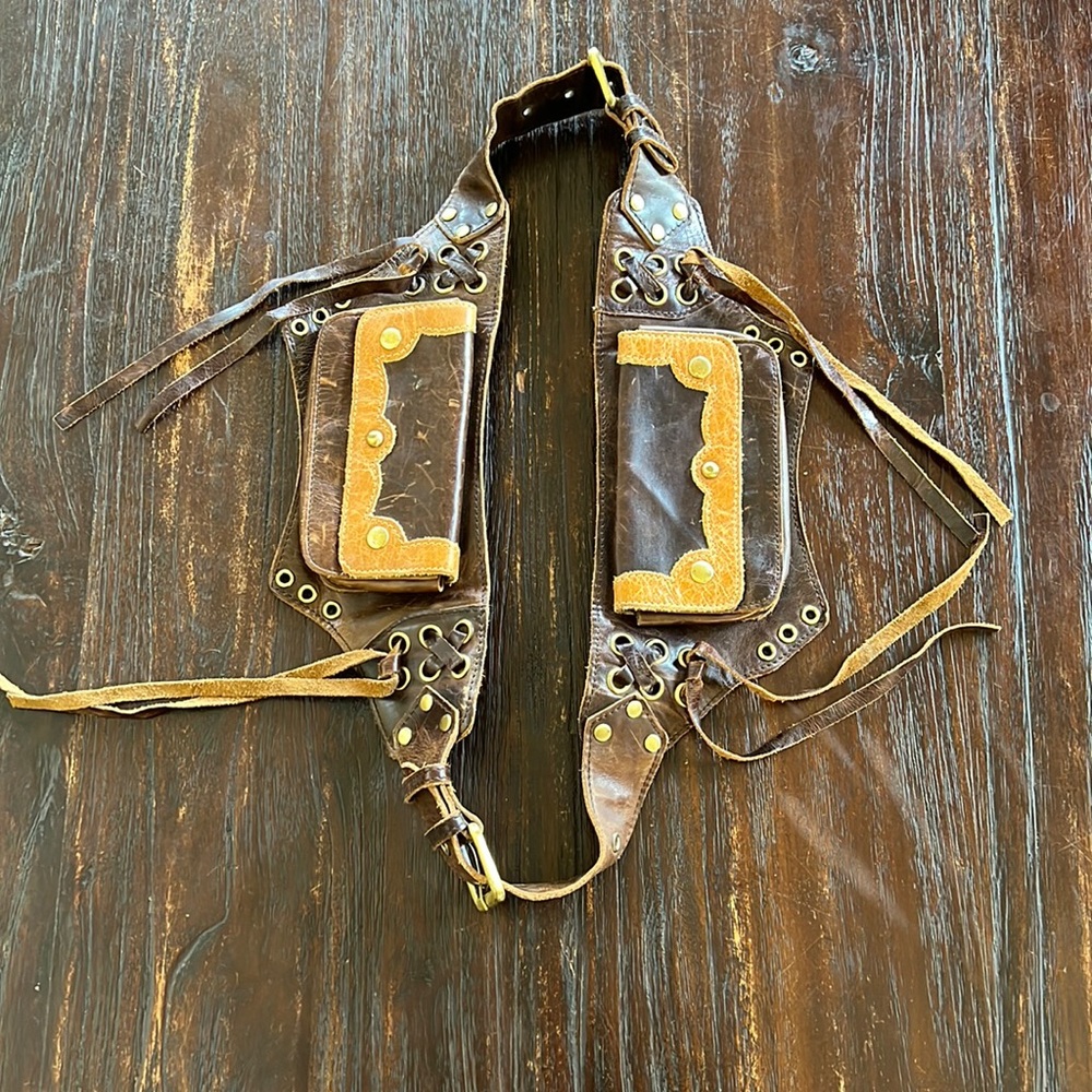Vicenzo brown distressed leather waist bag.